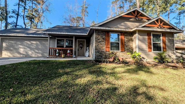 view of front facade with a front yard and a garage