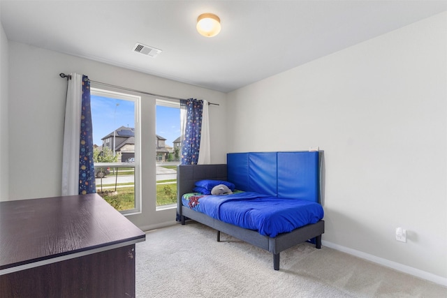 living area featuring carpet