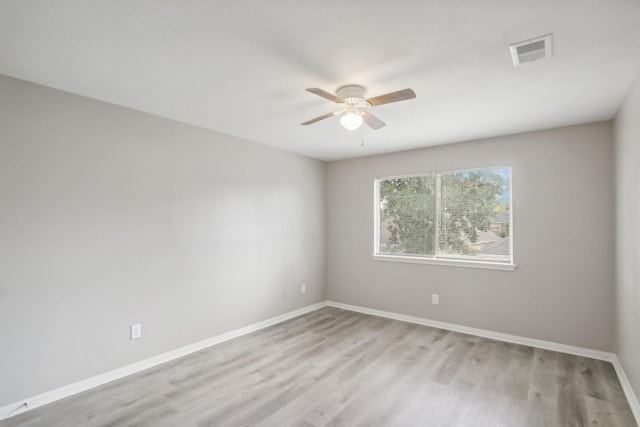 unfurnished room with light hardwood / wood-style floors and ceiling fan