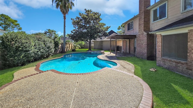 view of pool featuring a lawn, an in ground hot tub, and a patio