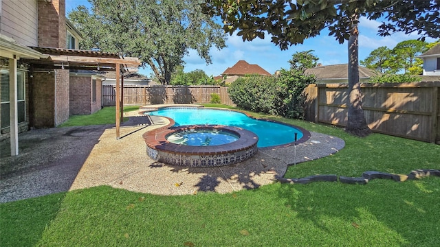 view of pool featuring a yard and an in ground hot tub