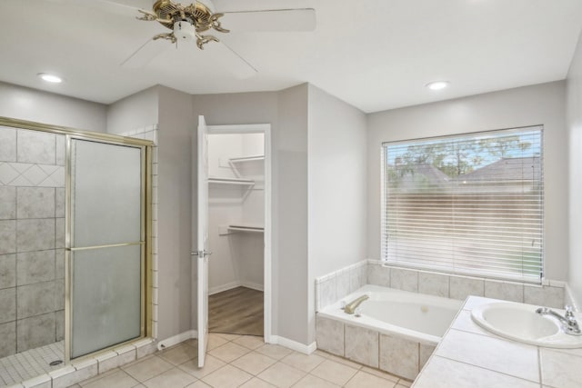 bathroom featuring tile patterned floors, ceiling fan, vanity, and independent shower and bath