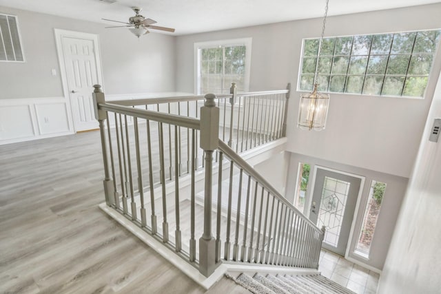 interior space with hardwood / wood-style flooring and a chandelier