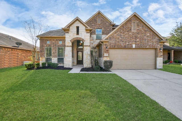 view of front of house featuring a garage and a front lawn