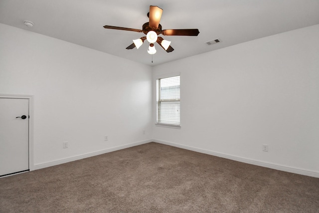 carpeted empty room with ceiling fan