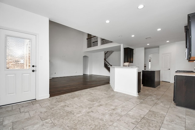 kitchen featuring dark brown cabinetry and a kitchen island