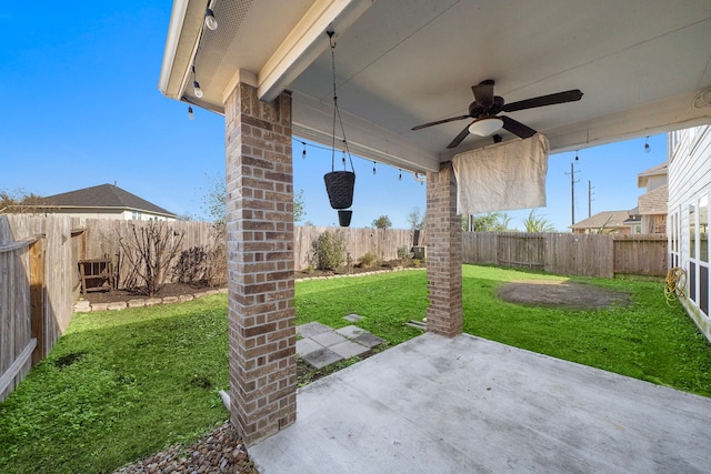 view of patio with ceiling fan