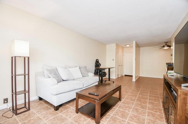 tiled living room with ceiling fan