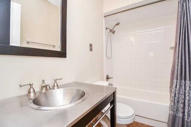 full bathroom featuring shower / bath combination with curtain, vanity, and toilet