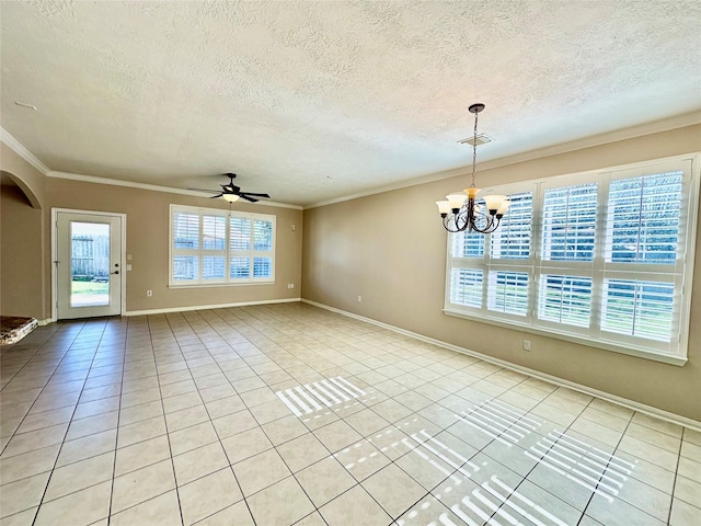 tiled empty room with a textured ceiling, ceiling fan with notable chandelier, and ornamental molding