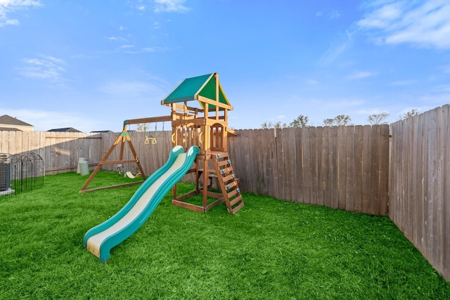 view of jungle gym featuring a lawn