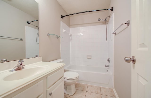 bathroom featuring tile patterned flooring, vanity, and toilet