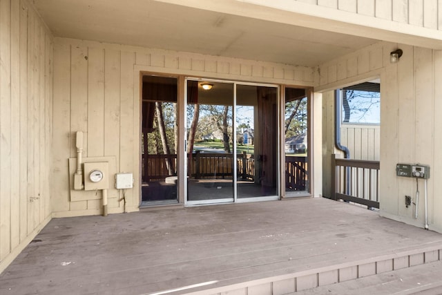 entrance to property featuring a deck