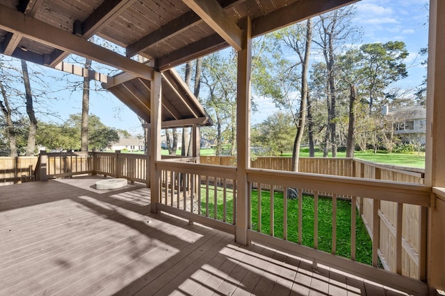 wooden deck with a yard