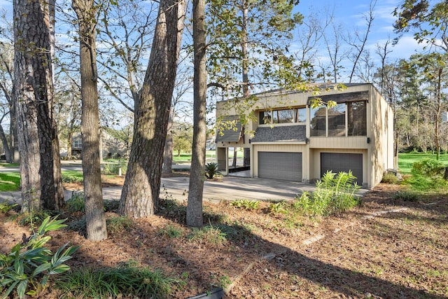 view of front of property with a garage