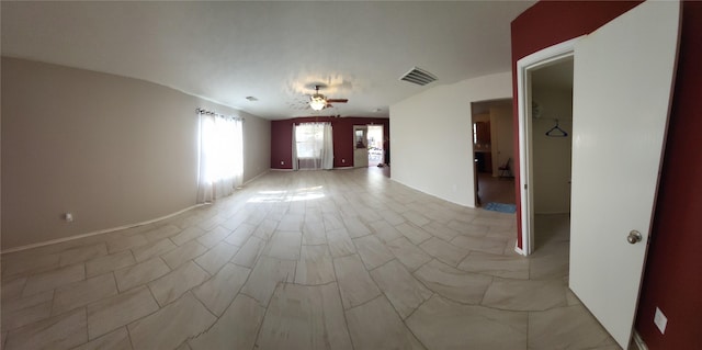 empty room featuring ceiling fan