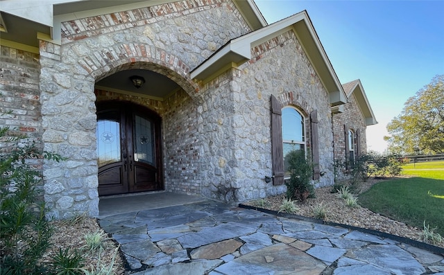 view of exterior entry with french doors