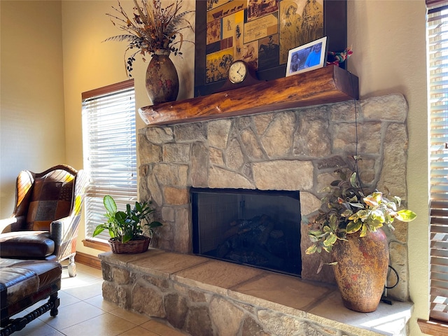 interior space with a stone fireplace