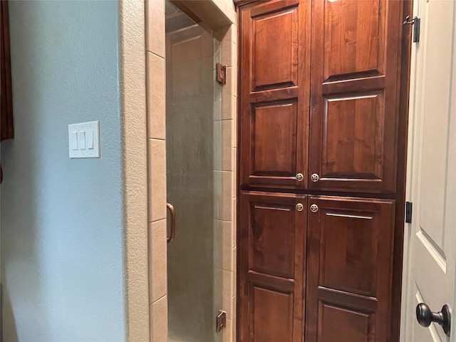 bathroom featuring walk in shower