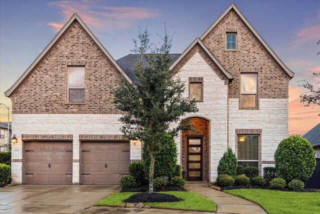 view of front of home with a garage