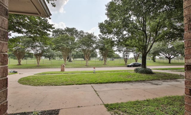 view of community featuring a yard