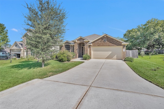 view of front of home featuring a front yard and a garage