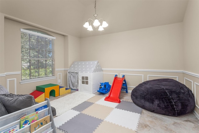 playroom with a chandelier