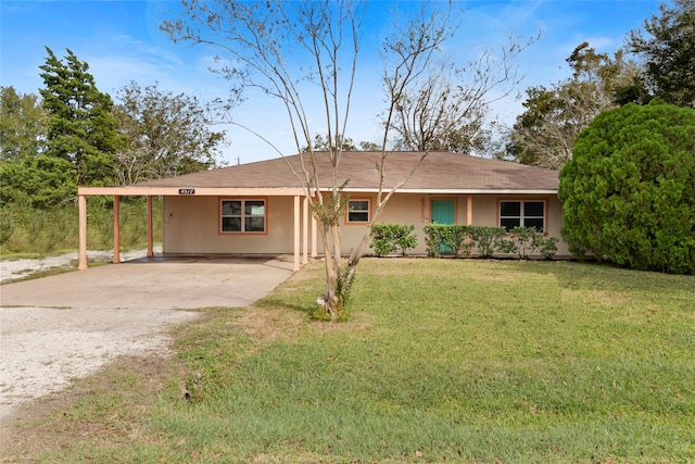 ranch-style house with a front lawn and a carport