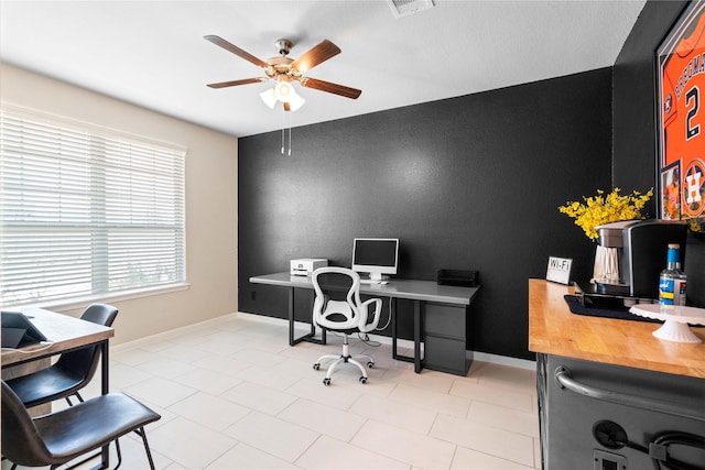 office area with ceiling fan