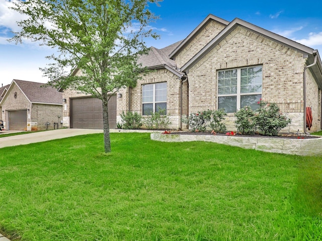 view of front facade featuring a front lawn and a garage