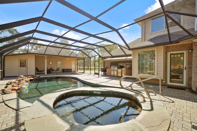 view of swimming pool featuring ceiling fan, area for grilling, glass enclosure, and a patio area