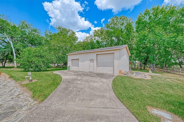 garage with a lawn