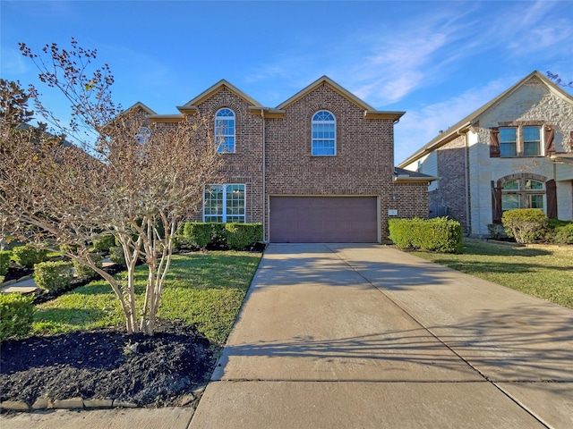 front facade featuring a front lawn and a garage