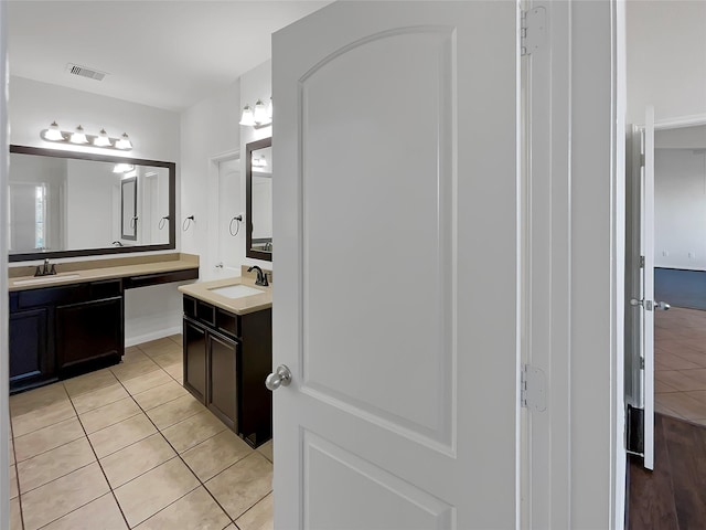 bathroom featuring vanity and tile patterned floors