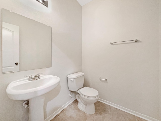 bathroom featuring toilet