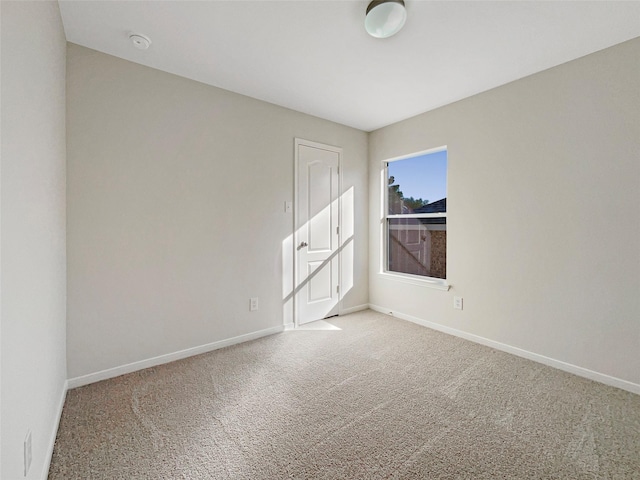 empty room featuring carpet