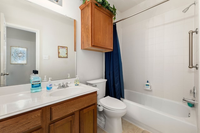 full bathroom with tile patterned flooring, shower / bath combo with shower curtain, vanity, and toilet