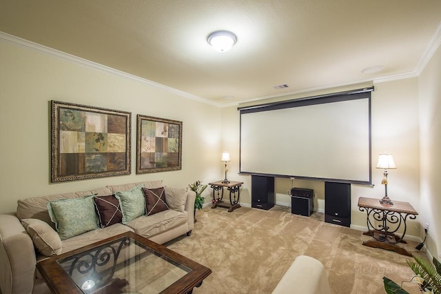 carpeted home theater with ornamental molding