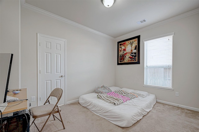 bedroom featuring ornamental molding and light carpet