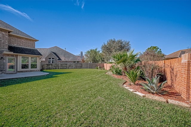 view of yard with a patio area