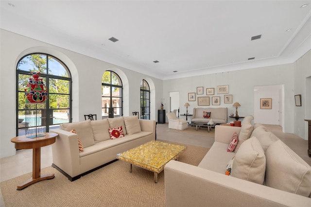 living room with french doors and ornamental molding