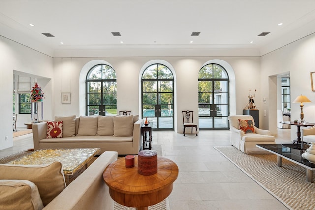 living room with light tile patterned floors and french doors