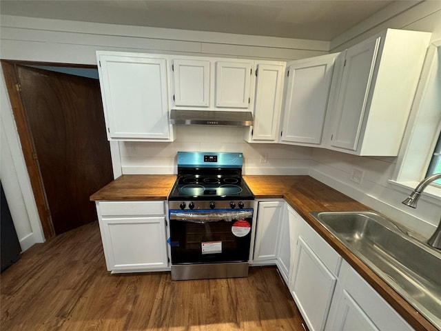 kitchen with sink, wooden counters, white cabinetry, and stainless steel electric stove