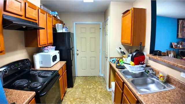 kitchen with sink and black appliances