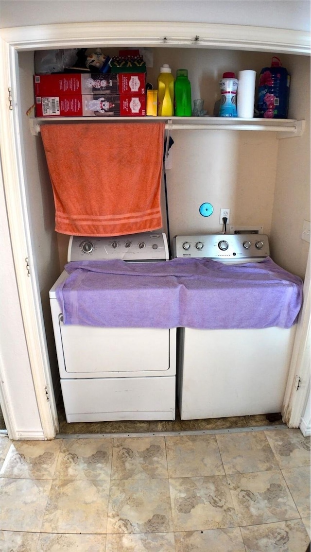 laundry area with separate washer and dryer