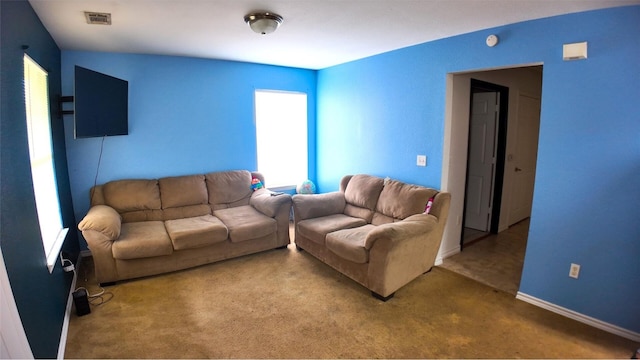 living room featuring carpet floors