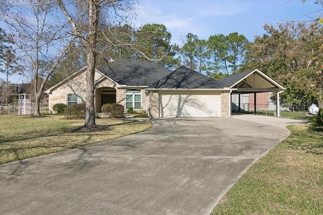 ranch-style house with a carport, a front yard, and a garage