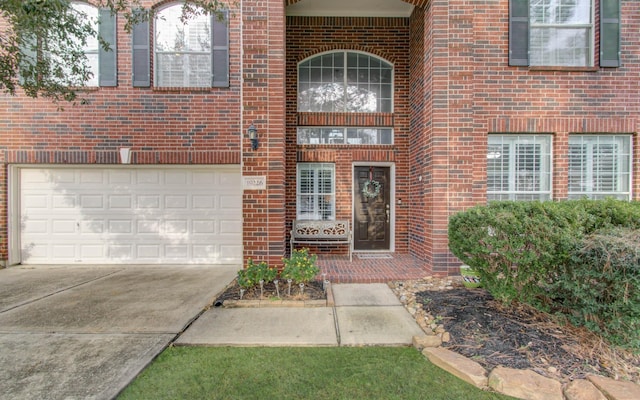 property entrance featuring a garage