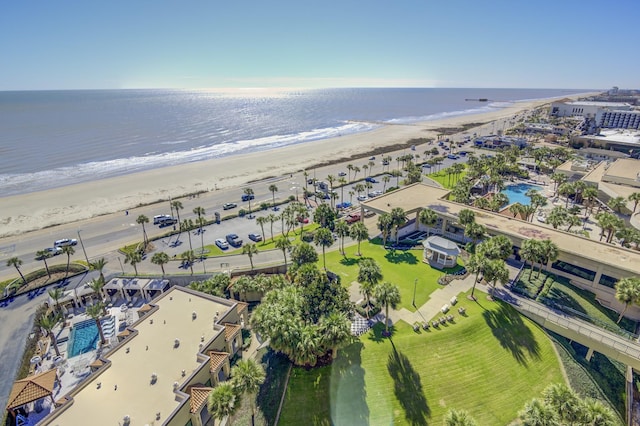 bird's eye view featuring a beach view and a water view