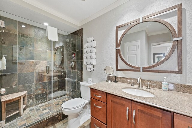 5220 Seawall Blvd Unit 1536/37, Galveston, TX 77551 - bathroom featuring crown molding, vanity, a textured wall, and a shower stall